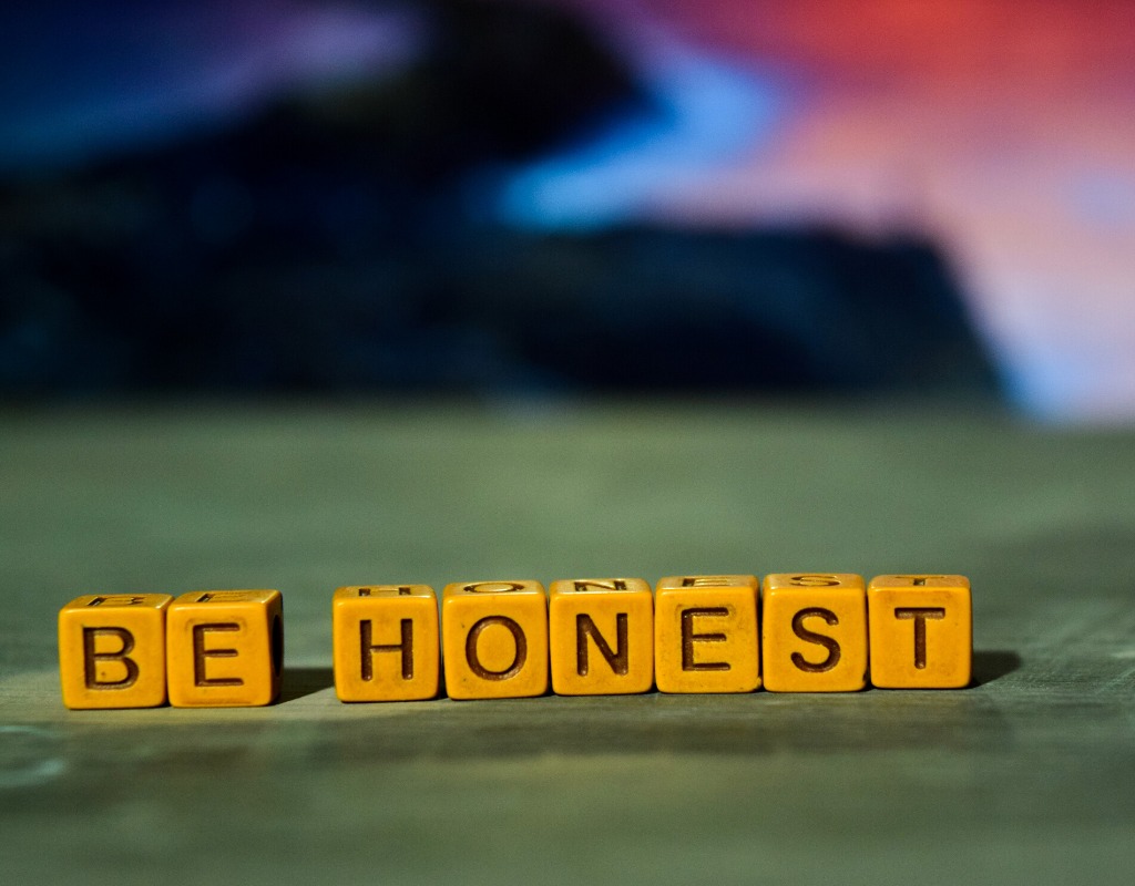 be honest words spelled using letters on a table