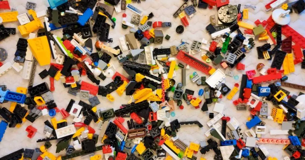 photo of lego pieces on a table